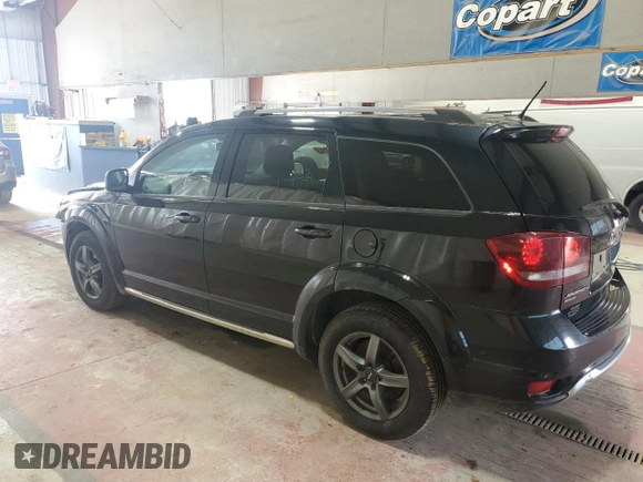 2015 Dodge Journey Crossroad with VIN 3C4PDDGGXFT725744, listed as a Copart auction lot 60808455 with 210,141 mi miles and Salvage title. Bid and sale history available at DreamBid. Image 2.