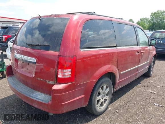 2010 Chrysler Town & Country Touring z VIN 2A4RR5D17AR109036, wystawiony jako IAAI lot #42418233 z przebiegiem 268 578 mil mil oraz . Historia ofert i sprzedaży dostępna na DreamBid. Obrazek 4.