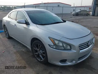 2014 Nissan Maxima S z VIN 1N4AA5AP0EC907191, wystawiony jako IAAI lot #42318639 z przebiegiem 156 105 mil mil oraz . Historia ofert i sprzedaży dostępna na DreamBid. Obrazek 1.