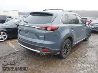 2022 Mazda CX-9 Grand Touring with VIN JM3TCBDYXN0628615, listed as a IAAI auction lot 41431786 with 28,738 mi miles. Bid and sale history available at carsss.com. Image 4.