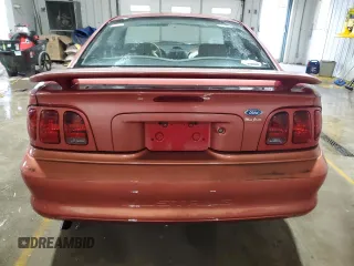 1996 Ford Mustang with VIN 1FALP4043TF202065, listed as a Copart auction lot 87761965 with 132,161 mi miles and Salvage Title. Bid and sale history available at carsss.com. Image 6.