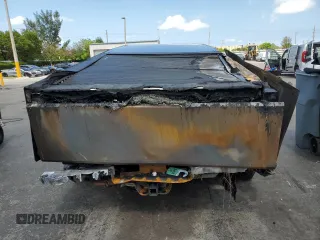 2024 Tesla Cybertruck с VIN 7G2CEHED3RA051591, выставлен на аукционе Copart как лот 56845395 с пробегом Не указан миль и На запчасти • Non repairable. История ставок и продаж доступна на DreamBid. Изображение 6.