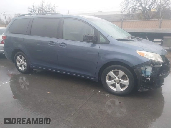 2015 Toyota Sienna LE AAS with VIN 5TDKK3DC8FS645154, listed as a IAAI auction lot 41513731 with 120,368 mi miles. Bid and sale history available at carsss.com. Image 1.
