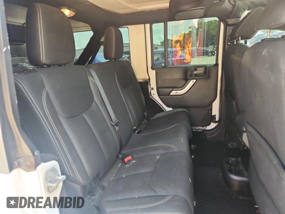2016 Jeep Wrangler Unlimited Sahara с VIN 1C4HJWEG3GL346528, выставлен на аукционе Copart как лот 65092755 с пробегом 127 393 миль миль и Списание • Salvage title. История ставок и продаж доступна на DreamBid. Изображение 11.