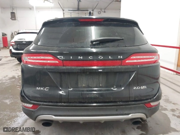 2015 Lincoln MKC with VIN 5LMCJ2A96FUJ47288, listed as a IAAI auction lot 41566290 with 102,316 mi miles. Bid and sale history available at carsss.com. Image 16.