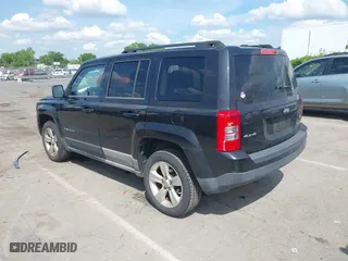 2011 Jeep Patriot Latitude with VIN 1J4NF1GB1BD100499, listed as a IAAI auction lot 42113428 with 195,123 mi miles. Bid and sale history available at carsss.com. Image 3.