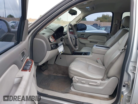 2010 Chevrolet Suburban LT with VIN 1GNUCJE03AR238548, listed as a IAAI auction lot 42104596 with 153,959 mi miles and . Bid and sale history available at DreamBid. Image 5.