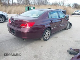 2007 Toyota Avalon XL with VIN 4T1BK36B37U173085, listed as a IAAI auction lot 41748541 with 164,021 mi miles. Bid and sale history available at carsss.com. Image 4.