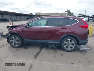 2019 Honda CR-V EX with VIN 7FARW2H56KE053022, listed as a IAAI auction lot 41848570 with 128,676 mi miles. Bid and sale history available at carsss.com. Image 15.