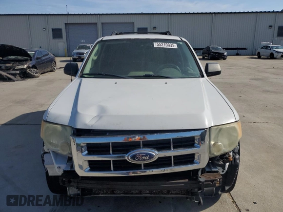 2009 Ford Escape XLS with VIN 1FMCU02719KB53740, listed as a Copart auction lot 55210035 with 144,672 mi miles and Salvage title. Bid and sale history available at DreamBid. Image 5.