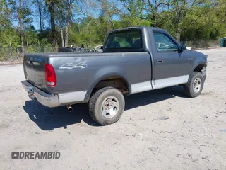 2003 Ford F-150 XL with VIN 1FTRF18243NB29920, listed as a IAAI auction lot 42037138 with 230,215 mi miles and . Bid and sale history available at DreamBid. Image 4.