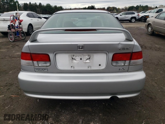 1999 Honda Civic EX z VIN 1HGEJ8242XL042360, wystawiony jako Copart lot #50969175 z przebiegiem 68 734 mil mil oraz Szkoda całkowita • Salvage title. Historia ofert i sprzedaży dostępna na DreamBid. Obrazek 6.