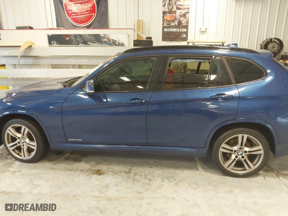 2015 BMW X1 xDrive28i with VIN WBAVL1C57FVY35998, listed as a IAAI auction lot 41740072 with 84,233 mi miles. Bid and sale history available at carsss.com. Image 13.