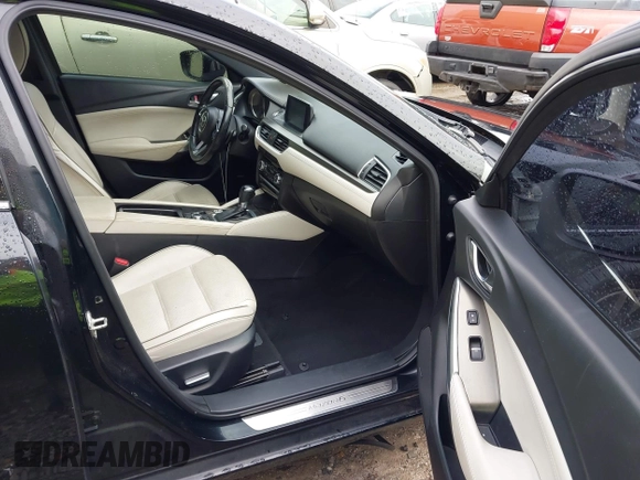 2017 Mazda 6 Grand Touring with VIN JM1GL1X54H1131788, listed as a IAAI auction lot 41640785 with 181,561 mi miles. Bid and sale history available at carsss.com. Image 5.