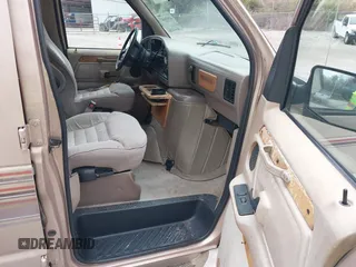 1994 Ford Econoline Cargo with VIN 1FDEE14N3RHB47183, listed as a IAAI auction lot 41953687 with 219,894 mi miles and . Bid and sale history available at carsss.com. Image 5.