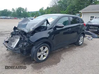 2013 Kia Sportage LX z VIN KNDPBCA28D7411444, wystawiony jako IAAI lot #42415041 z przebiegiem 150 524 mil mil oraz . Historia ofert i sprzedaży dostępna na DreamBid. Obrazek 20.