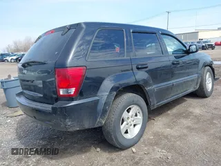 2008 Jeep Grand Cherokee Laredo with VIN 1J8GR48K48C119836, listed as a IAAI auction lot 42114083 with 129,352 mi miles. Bid and sale history available at carsss.com. Image 4.