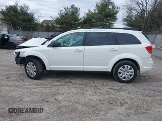2016 Dodge Journey SE with VIN 3C4PDCAB1GT104630, listed as a IAAI auction lot 41731485 with 233,992 mi miles. Bid and sale history available at carsss.com. Image 12.