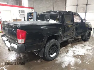 2016 Toyota Tacoma SR with VIN 3TMCZ5AN5GM037336, listed as a IAAI auction lot 41599492 with 76,262 mi miles. Bid and sale history available at carsss.com. Image 4.