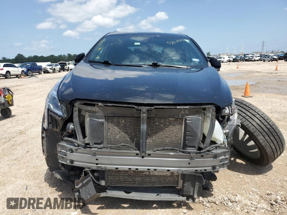 2022 Cadillac XT5 FWD Premium Luxury with VIN 1GYKNCRS0NZ178827, listed as a Copart auction lot 56200975 with 47,774 mi miles and Salvage title. Bid and sale history available at DreamBid. Image 5.