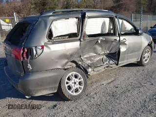 2005 Toyota Sienna LE with VIN 5TDBA23C15S032144, listed as a IAAI auction lot 41445395 with 258,574 mi miles and . Bid and sale history available at DreamBid. Image 4.