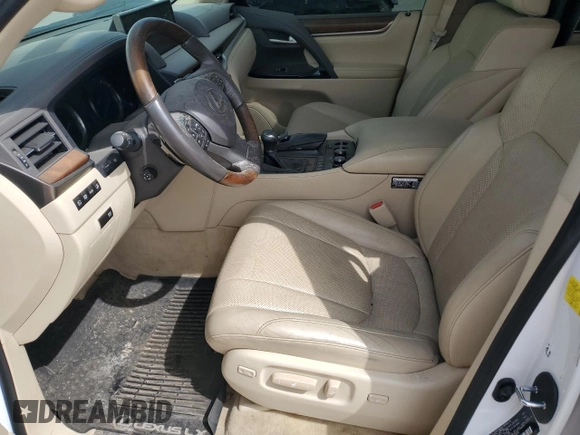 2017 Lexus LX 570 z VIN JTJHY7AX1H4243737, wystawiony jako Copart lot #47953415 z przebiegiem 69 509 mil mil oraz Szkoda całkowita • Salvage title. Historia ofert i sprzedaży dostępna na DreamBid. Obrazek 7.