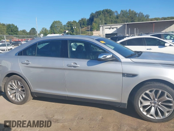2014 Ford Taurus Limited with VIN 1FAHP2F8XEG133523, listed as a IAAI auction lot 40285220 with 134,939 mi miles. Bid and sale history available at carsss.com. Image 13.