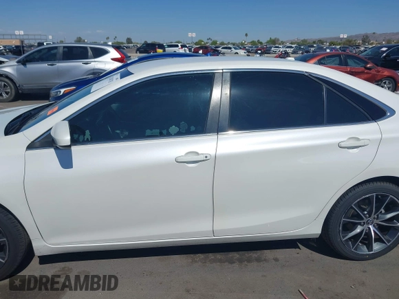 2015 Toyota Camry XLE with VIN 4T1BF1FK9FU052360, listed as a IAAI auction lot 42180783 with 119,079 mi miles and . Bid and sale history available at DreamBid. Image 14.