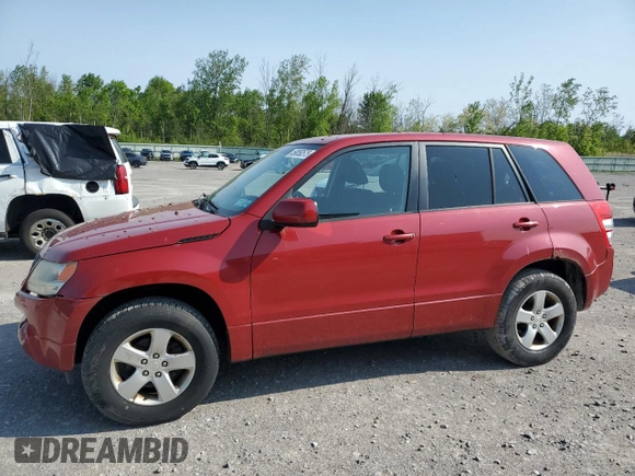 2012 Suzuki Grand Vitara Premium z VIN JS3TD0D60C4100503, wystawiony jako Copart lot #59050575 z przebiegiem 158 052 mil mil oraz Tytuł czysty. Historia ofert i sprzedaży dostępna na DreamBid. Obrazek 1.