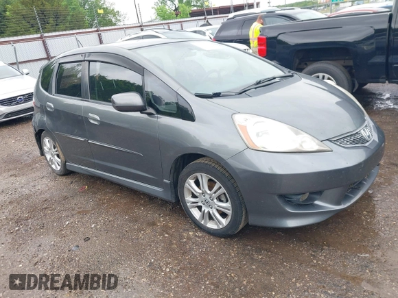 2011 Honda Fit Sport z VIN JHMGE8H51BC003715, wystawiony jako IAAI lot #42108476 z przebiegiem 174 228 mil mil oraz . Historia ofert i sprzedaży dostępna na DreamBid. Obrazek 1.