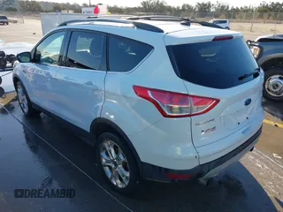 2013 Ford Escape SE with VIN 1FMCU0G9XDUD01410, listed as a IAAI auction lot 41758032 with 154,208 mi miles. Bid and sale history available at carsss.com. Image 3.