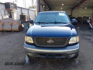 2002 Ford F-150 XLT with VIN 1FTRW086X2KE17566, listed as a IAAI auction lot 41721236 with 98,524 mi miles. Bid and sale history available at carsss.com. Image 12.