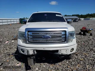 2013 Ford F-150 XLT with VIN 1FTFW1E65DFA84587, listed as a Copart auction lot 69295264 with 216,967 mi miles and Salvage Title. Bid and sale history available at carsss.com. Image 5.