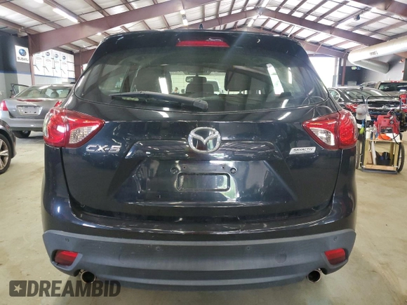 2014 Mazda CX-5 Sport с VIN JM3KE2BE0E0367493, выставлен на аукционе Copart как лот 57324195 с пробегом 103 367 миль миль и Списание • Salvage title. История ставок и продаж доступна на DreamBid. Изображение 6.