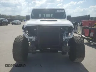 2023 Jeep Gladiator Mojave z VIN 1C6JJTEG7PL503422, wystawiony jako Copart lot #57415415 z przebiegiem 29 771 mil mil oraz Szkoda całkowita • Salvage title. Historia ofert i sprzedaży dostępna na DreamBid. Obrazek 5.