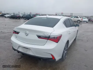 2019 Acura ILX w/Premium Pkg with VIN 19UDE2F70KA004051, listed as a IAAI auction lot 41543084 with 64,915 mi miles. Bid and sale history available at carsss.com. Image 4.