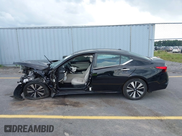 2021 Nissan Altima SV with VIN 1N4BL4DVXMN406122, listed as a IAAI auction lot 42512160 with 54,945 mi miles and . Bid and sale history available at DreamBid. Image 14.