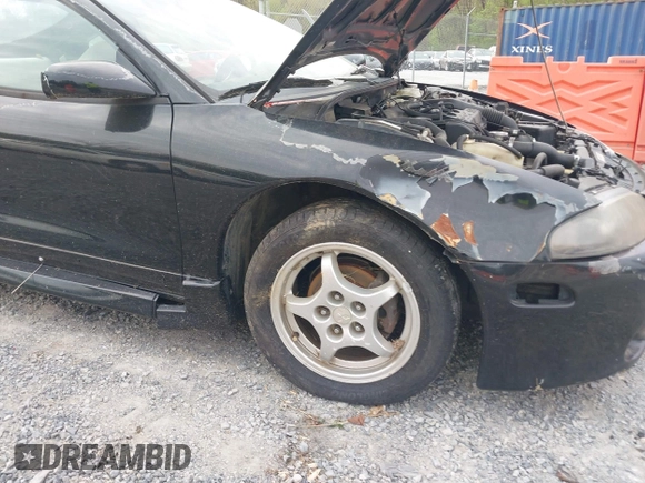 1997 Mitsubishi Eclipse with VIN 4A3AK44Y1VE042951, listed as a IAAI auction lot 42103920 with 119,268 mi miles and . Bid and sale history available at DreamBid. Image 6.