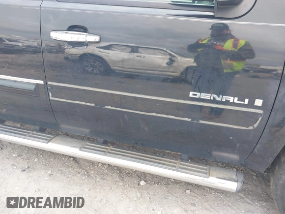 2008 GMC Sierra Denali z VIN 2GTEK638681161702, wystawiony jako IAAI lot #42078538 z przebiegiem Nie podano mil oraz . Historia ofert i sprzedaży dostępna na DreamBid. Obrazek 17.