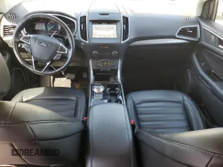 2019 Ford Edge SEL z VIN 2FMPK4J98KBB34524, wystawiony jako Copart lot #57313615 z przebiegiem 112 193 mil mil oraz Szkoda całkowita • Salvage title. Historia ofert i sprzedaży dostępna na DreamBid. Obrazek 8.