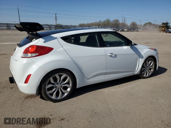 2013 Hyundai Veloster w/Gray Int z VIN KMHTC6ADXDU127194, wystawiony jako Copart lot #51751345 z przebiegiem 122 221 mil mil oraz Szkoda całkowita • Salvage title. Historia ofert i sprzedaży dostępna na DreamBid. Obrazek 3.