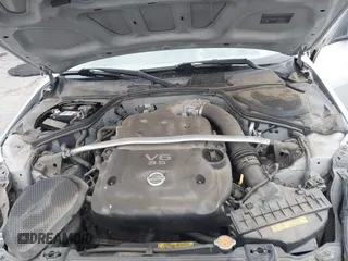 2006 Nissan 350Z Touring with VIN JN1AZ36A36M450659, listed as a IAAI auction lot 42034870 with 77,544 mi miles. Bid and sale history available at carsss.com. Image 10.