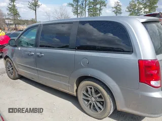 2015 Dodge Grand Caravan American Value with VIN 2C4RDGBG6FR576897, listed as a IAAI auction lot 41780897 with 159,823 mi miles and . Bid and sale history available at DreamBid. Image 14.