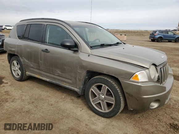 2008 Jeep Compass Sport with VIN 1J8FF47W68D639328, listed as a Copart auction lot 50756395 with 242,557 mi miles and Salvage Title. Bid and sale history available at carsss.com. Image 4.