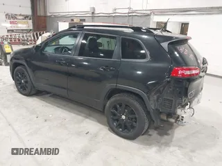 2014 Jeep Cherokee Latitude with VIN 1C4PJMCS6EW299532, listed as a IAAI auction lot 41833888 with 199,915 mi miles and . Bid and sale history available at DreamBid. Image 3.