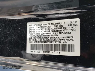 2016 Honda Odyssey SE with VIN 5FNRL5H34GB139571, listed as a IAAI auction lot 41602695 with 118,960 mi miles. Bid and sale history available at carsss.com. Image 9.