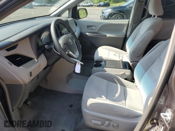 2015 Toyota Sienna LE with VIN 5TDJK3DC0FS112243, listed as a Copart auction lot 61791405 with 86,039 mi miles and Salvage title. Bid and sale history available at DreamBid. Image 7.