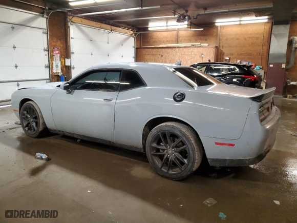2021 Dodge Challenger GT with VIN 2C3CDZKG4MH677316, listed as a Copart auction lot 86614104 with 60,283 mi miles and Salvage Title. Bid and sale history available at carsss.com. Image 2.