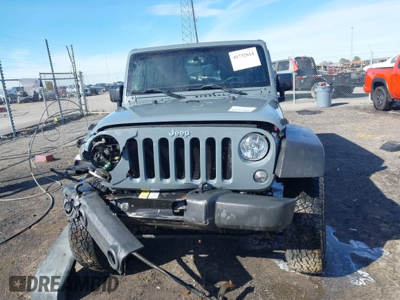 2015 Jeep Wrangler Unlimited Willys Wheeler with VIN 1C4BJWDG4FL589822, listed as a IAAI auction lot 41732614 with 149,112 mi miles and . Bid and sale history available at DreamBid. Image 13.