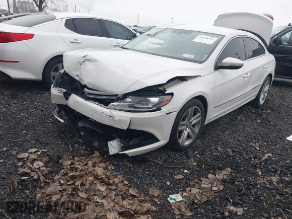 2014 Volkswagen CC Sport with VIN WVWBN7AN4EE505014, listed as a IAAI auction lot 41520345 with 140,422 mi miles and . Bid and sale history available at DreamBid. Image 2.